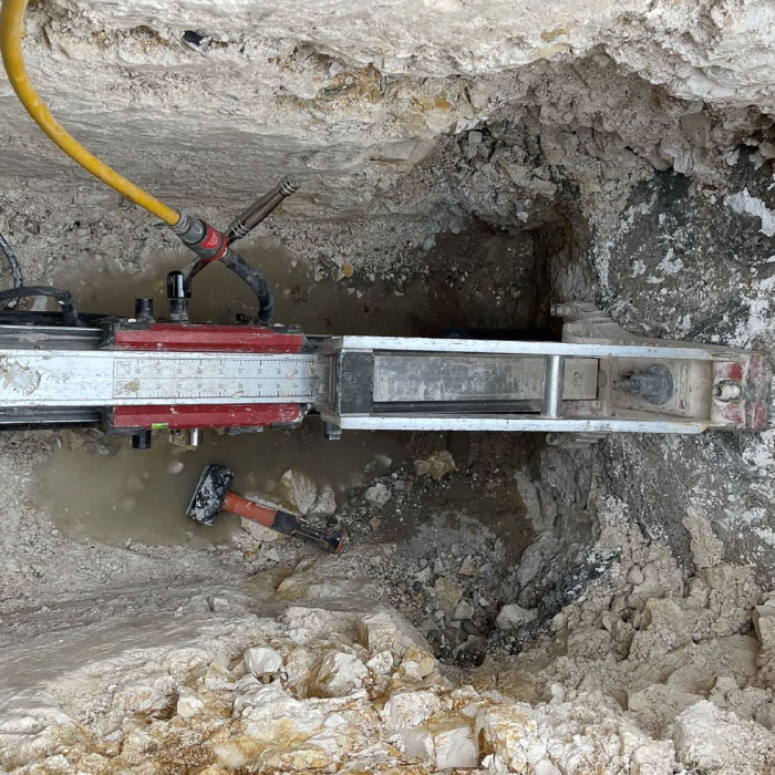 core drilling into mud soil for sampling in a london borough