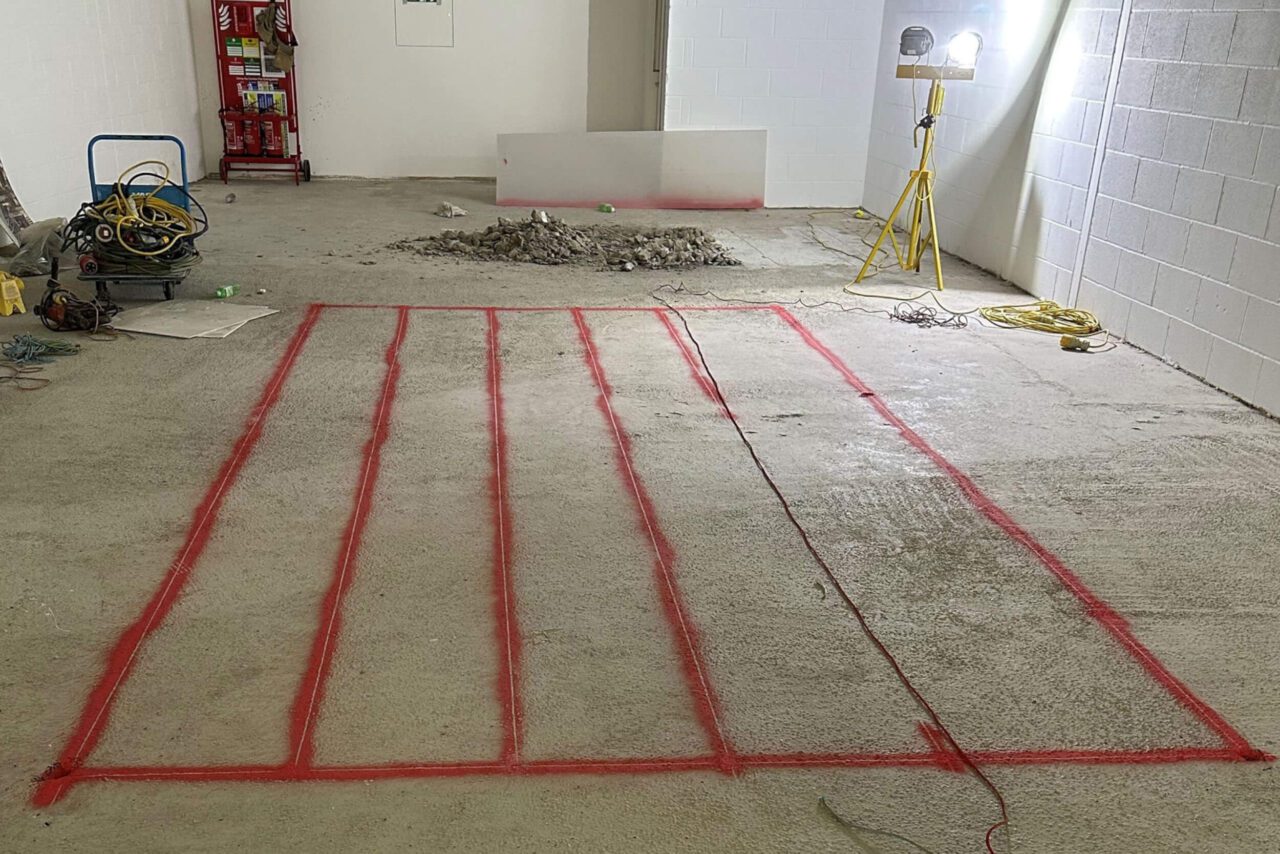 cutting a bespoke staircase opening in reinforced concrete markings