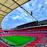 inside view of wembley stadium seats and green grass image