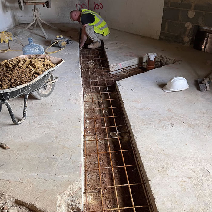 results are using a floor saw in a london building to channel pipes